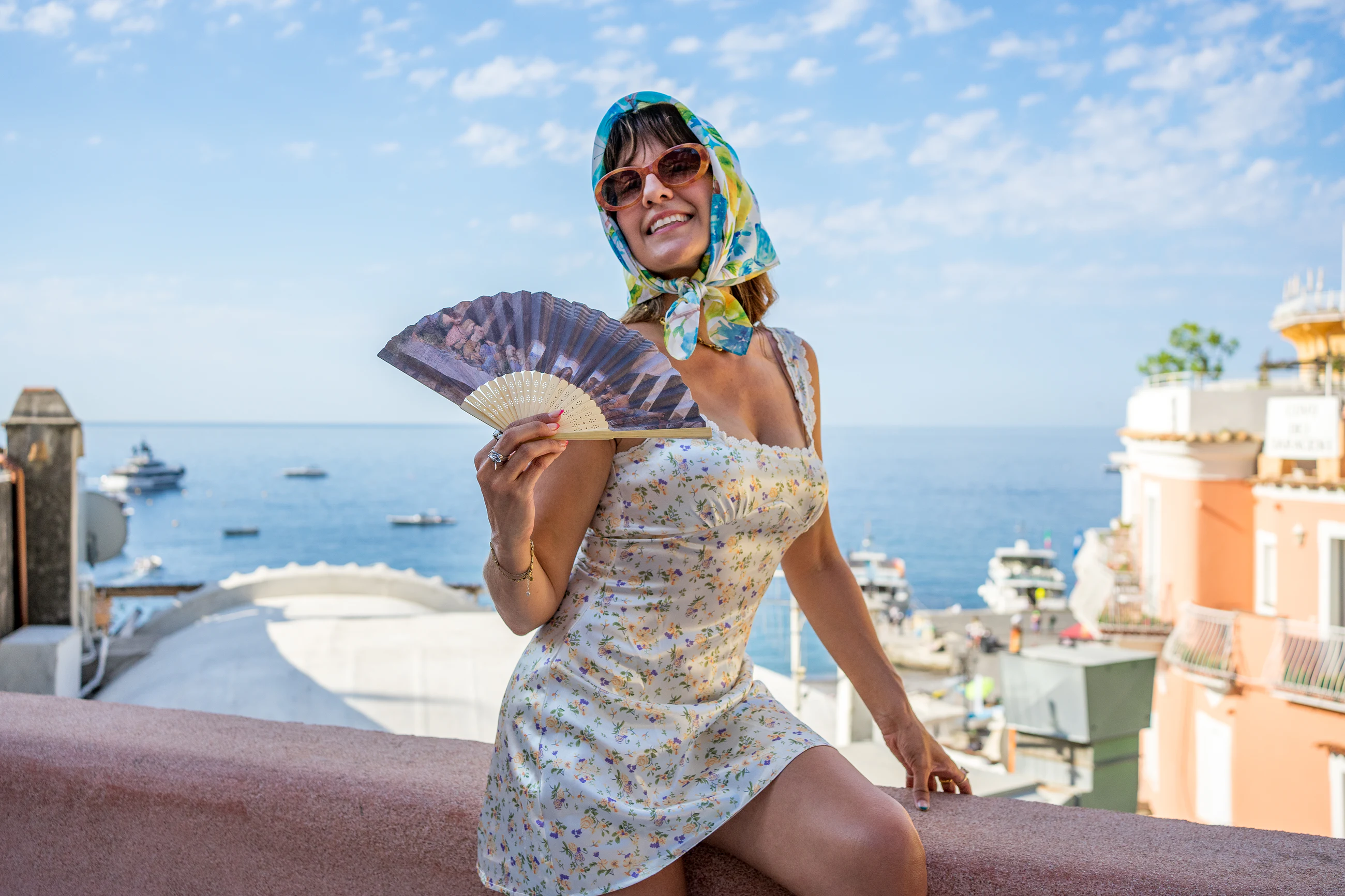 Portrait with fan and blue sky